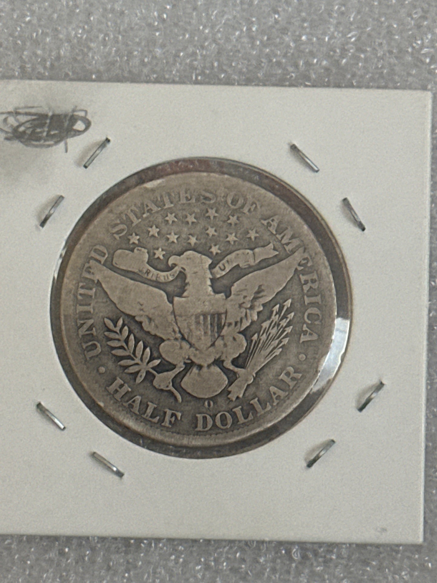 1907 O Morgan silver half dollar